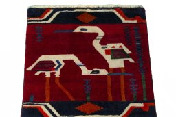 Surface texture of 2000s Shiraz rug with natural Wool and intricate pattern