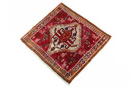 Corner detail of 2000s Shiraz rug showing border pattern and Wool pile