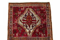 Surface texture of 2000s Shiraz rug with natural Wool and intricate pattern