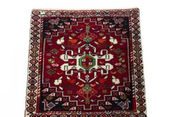 Surface texture of 2000s Shiraz rug with natural Wool and intricate pattern