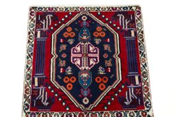 Surface texture of 2000s Shiraz rug with natural Wool and intricate pattern