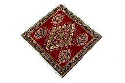Corner detail of 2000s Shiraz rug showing border pattern and Wool pile