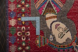 Backside of handmade 2000s Shiraz rug showing knot structure and weave density