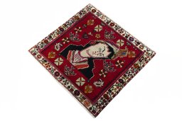 Corner detail of 2000s Shiraz rug showing border pattern and Wool pile
