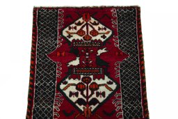 Surface texture of 2000s Shiraz rug with natural Wool and intricate pattern