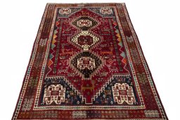 Surface texture of 2000s Shiraz rug with natural Wool and intricate pattern