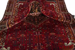 Close-up detail of 2000s Shiraz rug from Iran / Persia showing Wool weave