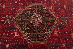 Central medallion detail of 2000s Shiraz rug from Iran / Persia