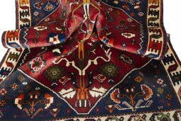 Close-up detail of 2000s Shiraz rug from Iran / Persia showing Wool weave
