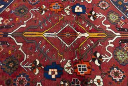Central medallion detail of 2000s Shiraz rug from Iran / Persia