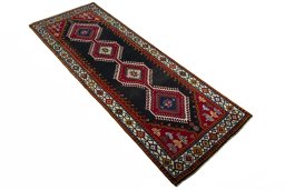 Close-up detail of 2000s Shiraz rug from Iran / Persia showing Wool weave