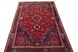 Surface texture of 1970s Shiraz rug with natural Wool and intricate pattern