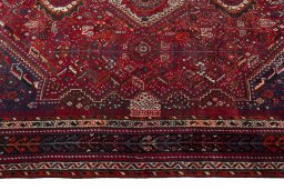 Full view of 1970s Shiraz rug from Iran / Persia, 274 × 183 cm in Red tones