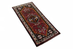 Close-up detail of 2000s Shiraz rug from Iran / Persia showing Wool weave