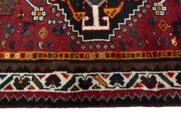 Close-up detail of 2000s Shiraz rug from Iran / Persia showing Wool weave