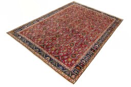 Corner detail of 2000s Shiraz rug showing border pattern and Wool pile