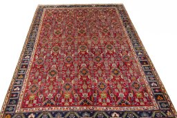 Surface texture of 2000s Shiraz rug with natural Wool and intricate pattern