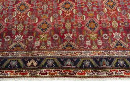 Full view of 2000s Shiraz rug from Iran / Persia, 307 × 213 cm in Red tones