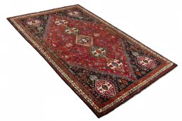 Close-up detail of 2000s Shiraz rug from Iran / Persia showing Wool weave