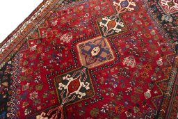 Backside of handmade 2000s Shiraz rug showing knot structure and weave density
