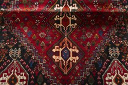 Full view of 2000s Shiraz rug from Iran / Persia, 270 × 173 cm in Red tones