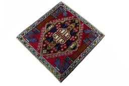 Corner detail of 2000s Shiraz rug showing border pattern and Wool pile