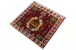 Corner detail of 2000s Shiraz rug showing border pattern and Wool pile