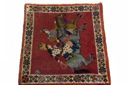 Surface texture of 2000s Shiraz rug with natural Wool and intricate pattern