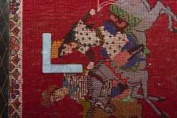 Backside of handmade 2000s Shiraz rug showing knot structure and weave density
