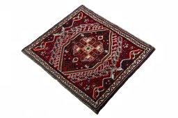 Corner detail of 2000s Shiraz rug showing border pattern and Wool pile