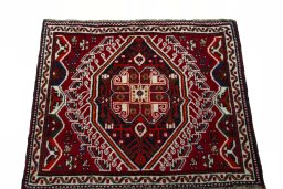 Surface texture of 2000s Shiraz rug with natural Wool and intricate pattern