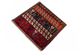 Corner detail of 2000s Shiraz rug showing border pattern and Wool pile