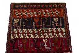 Surface texture of 2000s Shiraz rug with natural Wool and intricate pattern