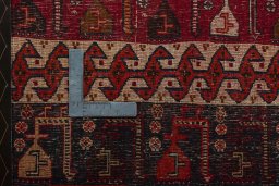 Backside of handmade 2000s Shiraz rug showing knot structure and weave density