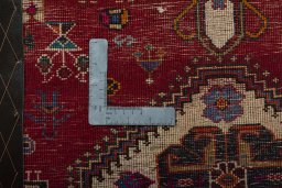 Backside of handmade 2000s Shiraz rug showing knot structure and weave density