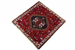 Corner detail of 2000s Shiraz rug showing border pattern and Wool pile