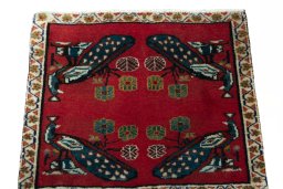Surface texture of 2000s Shiraz rug with natural Wool and intricate pattern