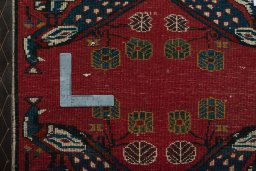 Backside of handmade 2000s Shiraz rug showing knot structure and weave density