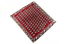 Corner detail of 2000s Shiraz rug showing border pattern and Wool pile
