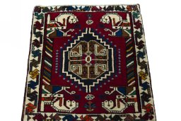 Surface texture of 2000s Shiraz rug with natural Wool and intricate pattern