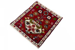 Corner detail of 2000s Shiraz rug showing border pattern and Wool pile