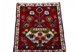 Surface texture of 2000s Shiraz rug with natural Wool and intricate pattern