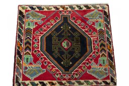 Surface texture of 2000s Shiraz rug with natural Wool and intricate pattern