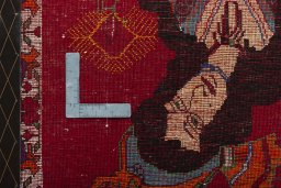 Backside of handmade 2000s Shiraz rug showing knot structure and weave density