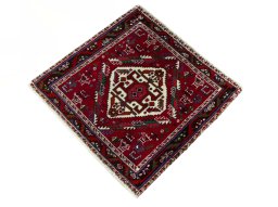 Corner detail of 2000s Shiraz rug showing border pattern and Wool pile