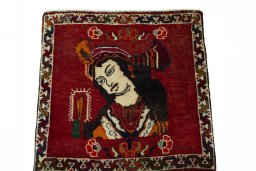 Surface texture of 2000s Shiraz rug with natural Wool and intricate pattern