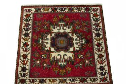 Surface texture of 2000s Shiraz rug with natural Wool and intricate pattern