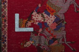 Backside of handmade 2000s Shiraz rug showing knot structure and weave density