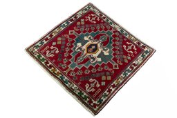 Corner detail of 2000s Shiraz rug showing border pattern and Wool pile