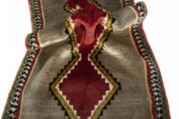 Corner detail of 2000s Shiraz rug showing border pattern and Wool pile